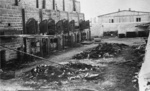 Remains of carbonized corpses lying around near the crematorium ovens at Majdanek. Photograph taken after the liberation of the camp in July 1944. (IPN)